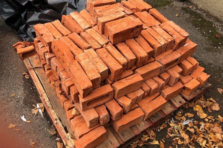 A pile of handmade bricks, for the artwork 'Mad of this Land'